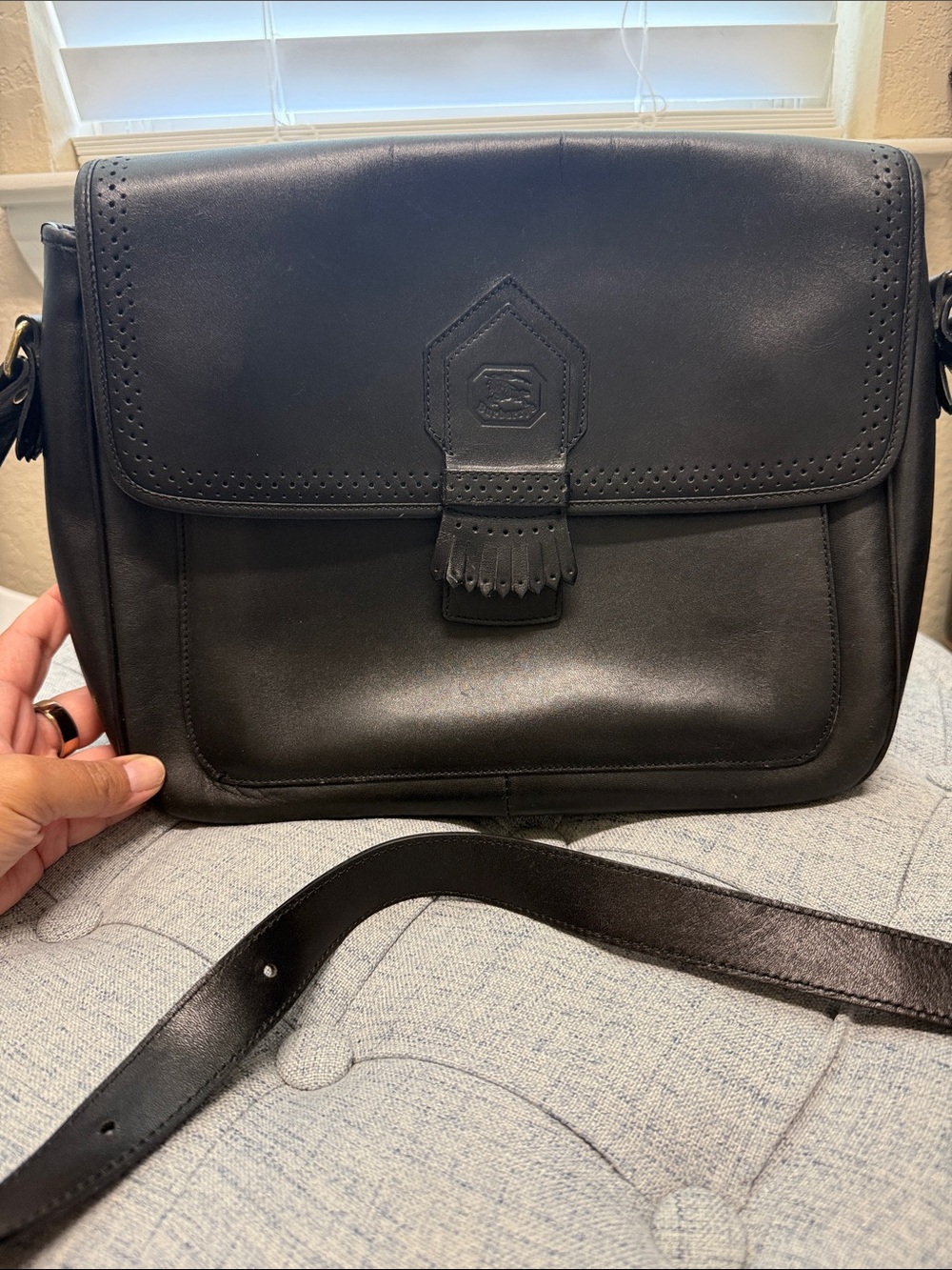 Burberrys Classic Black Leather Bag with Embossed Crest